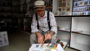 Nevşehir'de yaşayan 73 yaşındaki öğretmen emeklisi ressam, dünyanın önemli turizm