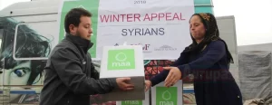 Hatay'ın Kırıkhan ilçesinde, ihtiyaç sahibi Suriyeli 500 aileye merkezi Avustralya'da