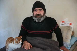 Türkiye Diyanet Vakfının kendisine hediye ettiği elektrikli tekerlekli sandalye ile