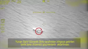 İleryoz Adası doğusunda, Yunan Sahil Güvenlik botu tarafından taşınan düzensiz